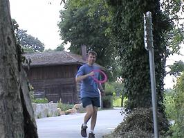 Michael retrieves the Aerobie from the cycle path at our lunch spot at Sutz-Lattringen